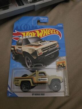 Hot Wheels '87 Dodge D100 Toy Truck - Cream with Yellow & Orange Accents